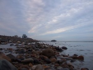 133526-the-dawning-sun-reflecting-off-the-cloud-covered-sky-hove-united-kingdom