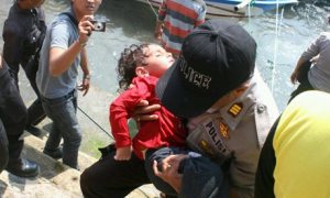 rescuer with exhausted child