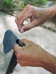 working with our own hands....tentmaking