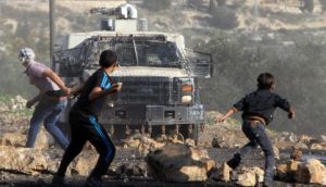 Palestinian youths protest